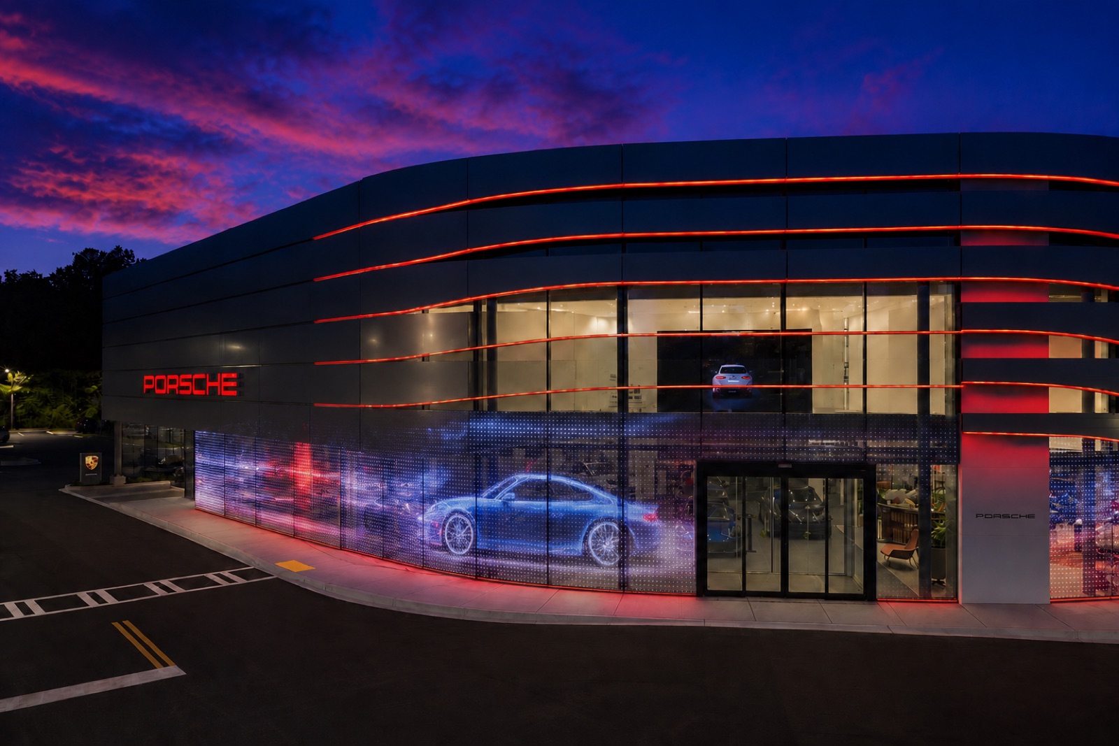 Concept visualization: transparent LED wrapping the curved glass base of a sports-car showroom